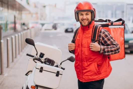 food-delivery-boy-delivering-food-scooter_1303-27695